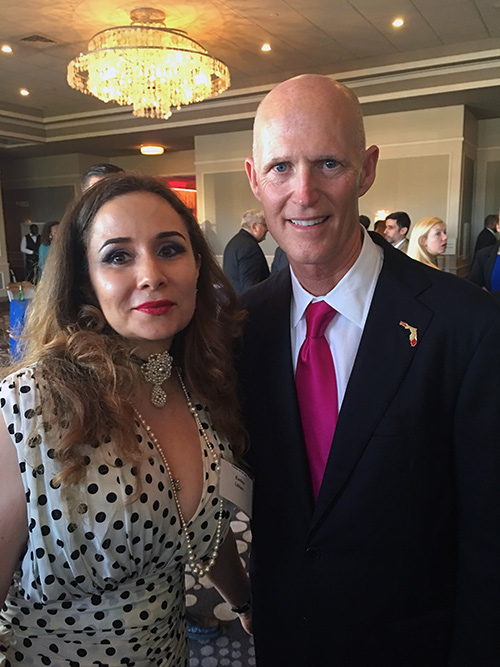 Evelina Libhen with the Governor of Florida, Rick Scott